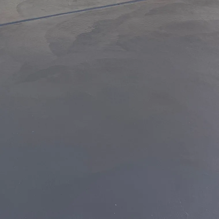 Close-up of a smooth steel-troweled concrete floor