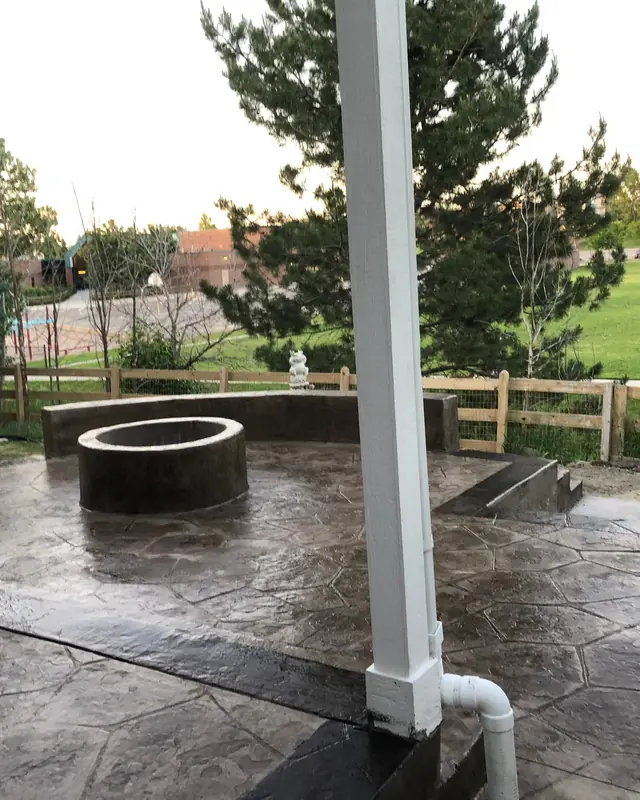 Charcoal stone-stamp patio with fire pit
