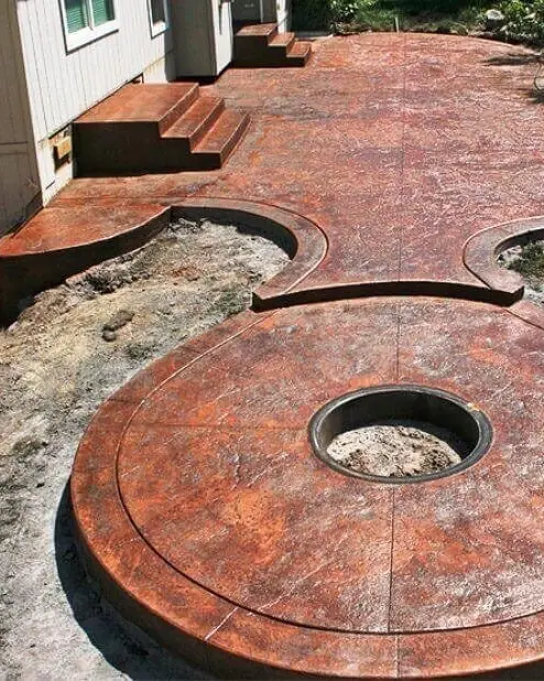 Stamped patio with round fire pit