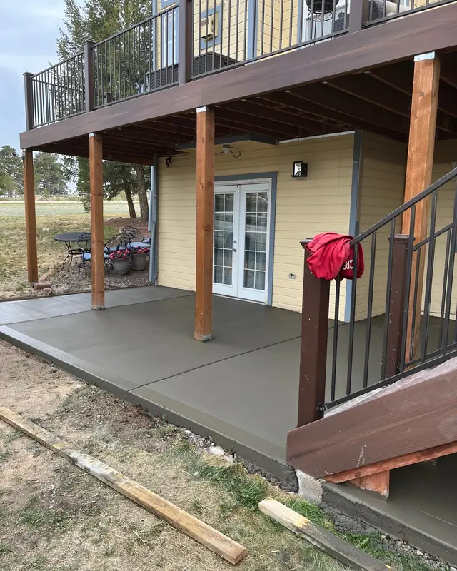 Patio slab under a deck