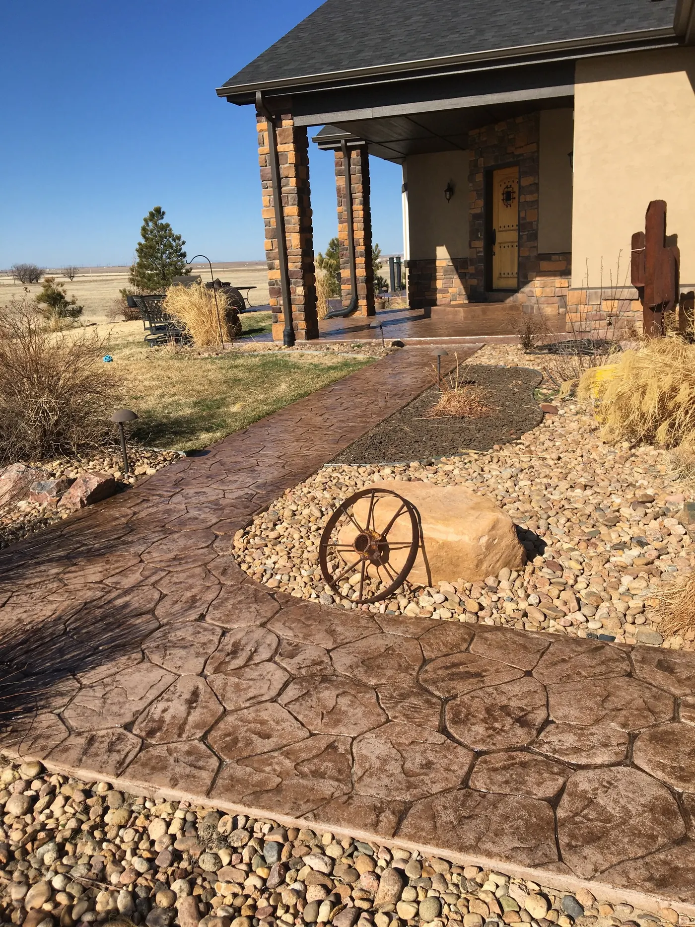 Flagstone-stamped front walk