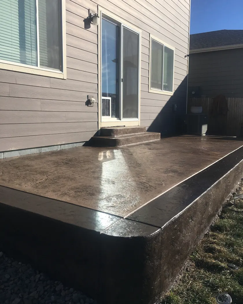 A finished charcoal stamped patio