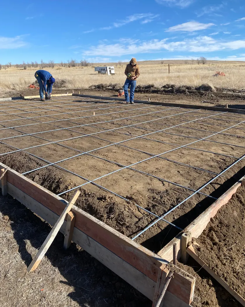 Forms and a rebar grid on the plains